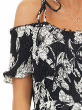 Load image into Gallery viewer, Black and White Floral Smocked Mini Dress with Strap Details